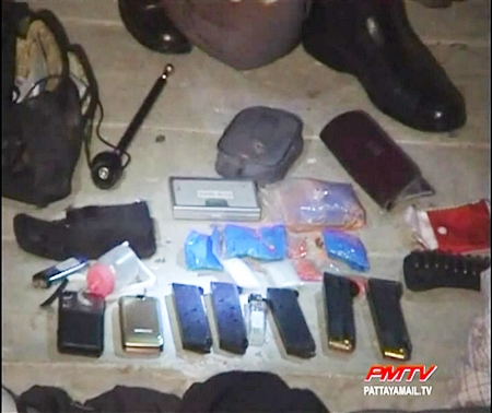 The haul of guns, ammunition and drugs are confiscated by the police.